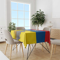 Rectangular Ecuador-themed tablecloth in flag colors on dining table with chairs
