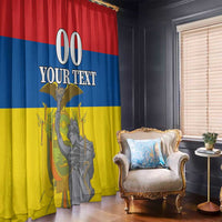 Custom window curtain panels with red, blue, and yellow monument print in a room
