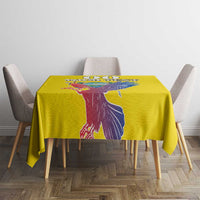 Square yellow tablecloth with large condor graphic centered on the table