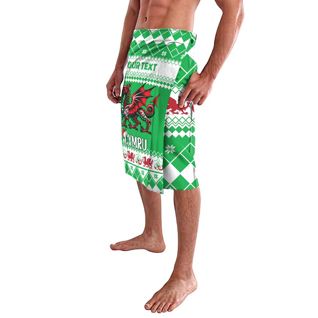 Green patterned lavalava with dragon graphic, Cymru text, and side view drape