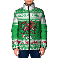 Green padded zip-up jacket with dragon graphic, white patterned yoke and hood