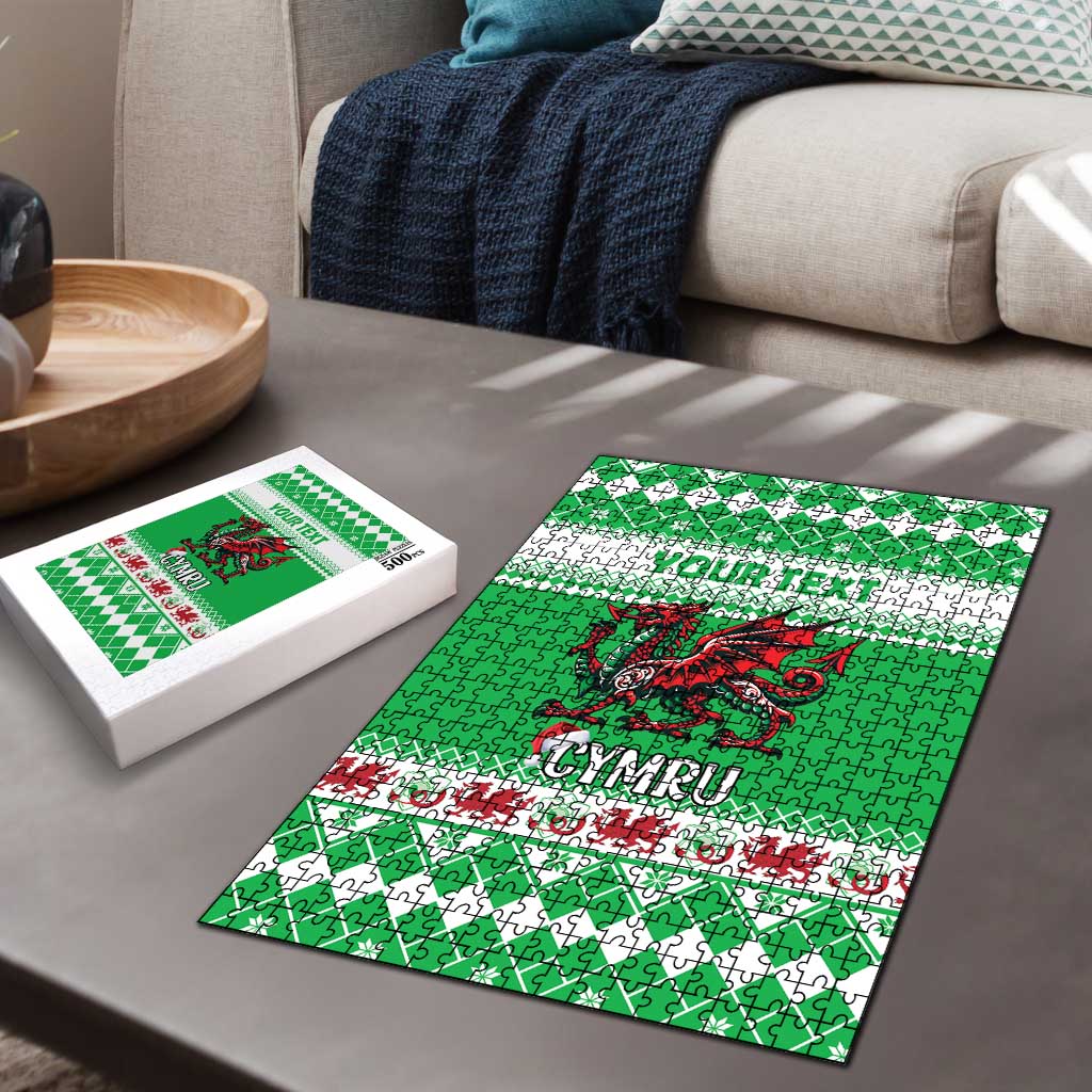 Green red dragon jigsaw puzzle with CYMRU text on sofa and matching puzzle box