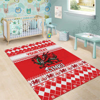 Red Christmas area rug with Welsh dragon and checkered CYMRU design