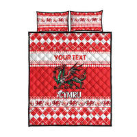 Red quilt bed set with green dragon, CYMRU logo, and white geometric holiday pattern
