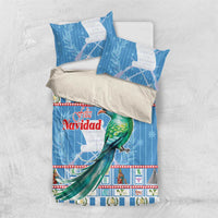 Blue Christmas duvet set with parrot motif and red 'Feliz Navidad' lettering, with pillows