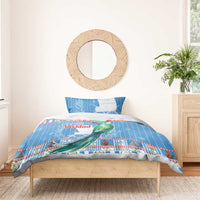 Blue Christmas duvet set with parrot graphic and 'Feliz Navidad' text, plus matching pillow