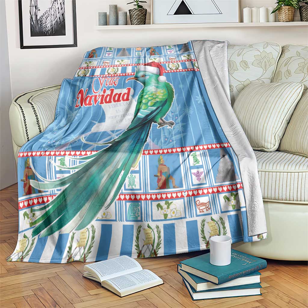 Blue Christmas blanket with green bird in Santa hat and Feliz Navidad festive border