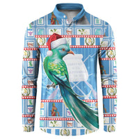 Blue button-front sweatshirt with colorful parrot and red Santa hat graphic