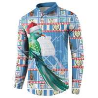 Blue button-front sweatshirt with parrot in red Santa hat, festive tile pattern