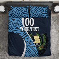 Navy football bedding set with blue geometric design, '00 YOUR TEXT' text, and 2 pillowcases