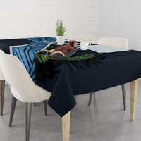 Custom football tablecloth draped over dining table: dark navy with blue geometric and leaf print