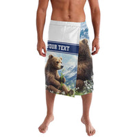 Personalized graphic swim shorts with white waistband, blue bear scene and flowers
