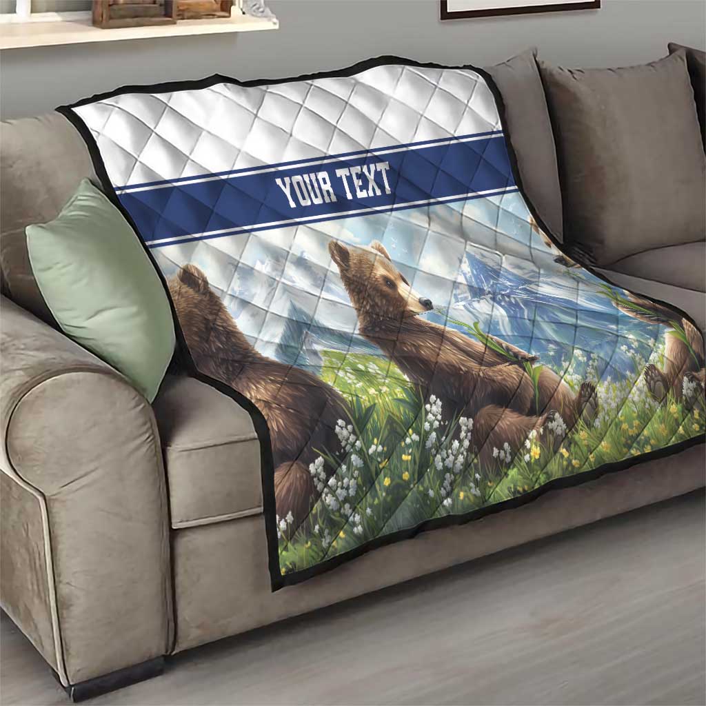 Quilt blanket with bear cubs, blue striped mountain scene, and 'YOUR TEXT' text