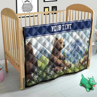 Quilt blanket with bear cubs, blue diamond quilting, floral foreground, and 'YOUR TEXT'