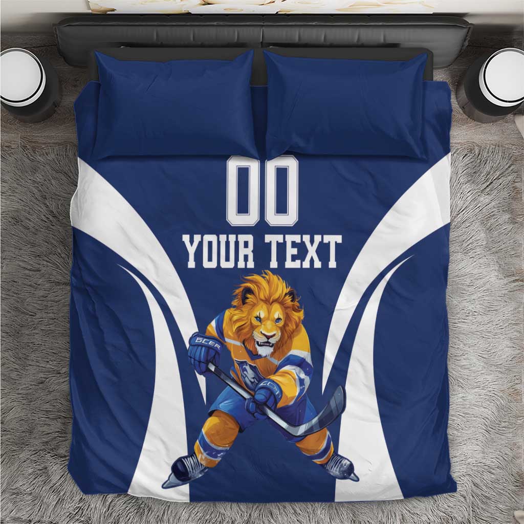Blue hockey mascot bedding set with “YOUR TEXT,” “00,” and lion goalie graphic
