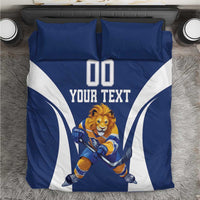 Blue hockey mascot bedding set with “YOUR TEXT,” “00,” and lion goalie graphic