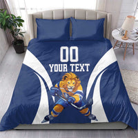 Blue and white hockey bedding set featuring lion goalie, “YOUR TEXT,” and “00”