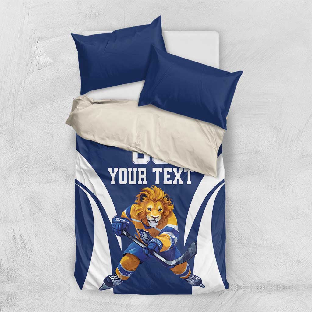 Blue hockey bedding set with lion mascot, “YOUR TEXT,” and “00” on comforter