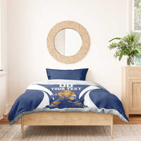 Blue hockey comforter and pillow set with lion goalie, “YOUR TEXT,” and “00”