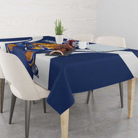 Blue hockey tablecloth with hockey-themed mascot graphics and white side panels on table