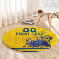 Yellow round hockey area rug with blue 'YOUR TEXT' and goalie illustration, partial view