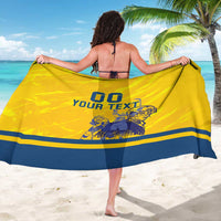 Yellow hockey sarong with blue stripes and custom text, shown from back