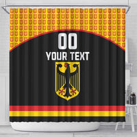 Black shower curtain with German crest, red-yellow stripe, repeating top icons