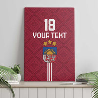 Red canvas wall art showing "18 YOUR TEXT" and Latvia crest, geometric folk pattern