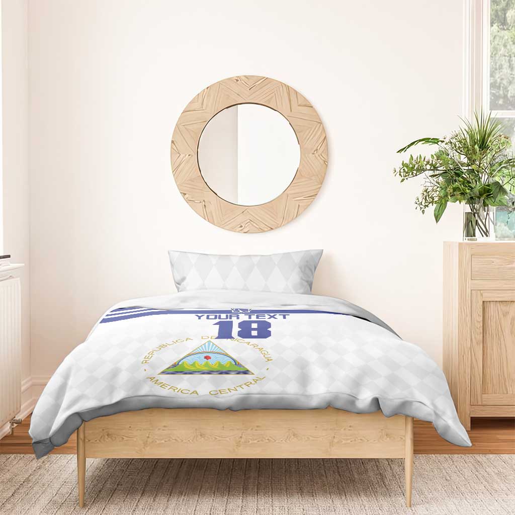 Football bedding set: white duvet with blue stripe, crest, and number 18, with one pillow