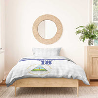Football bedding set: white duvet with blue stripe, crest, and number 18, with one pillow