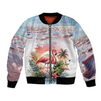 Pink bomber jacket with front flamingo and tropical foliage graphic, black ribbed trim