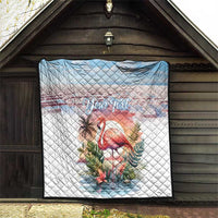 White personalized flamingo quilt with light-blue top band, tropical foliage, "Your Text" centered.