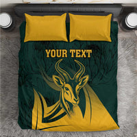 Springbok bedding set: green duvet with yellow accents and two pillows, “YOUR TEXT”
