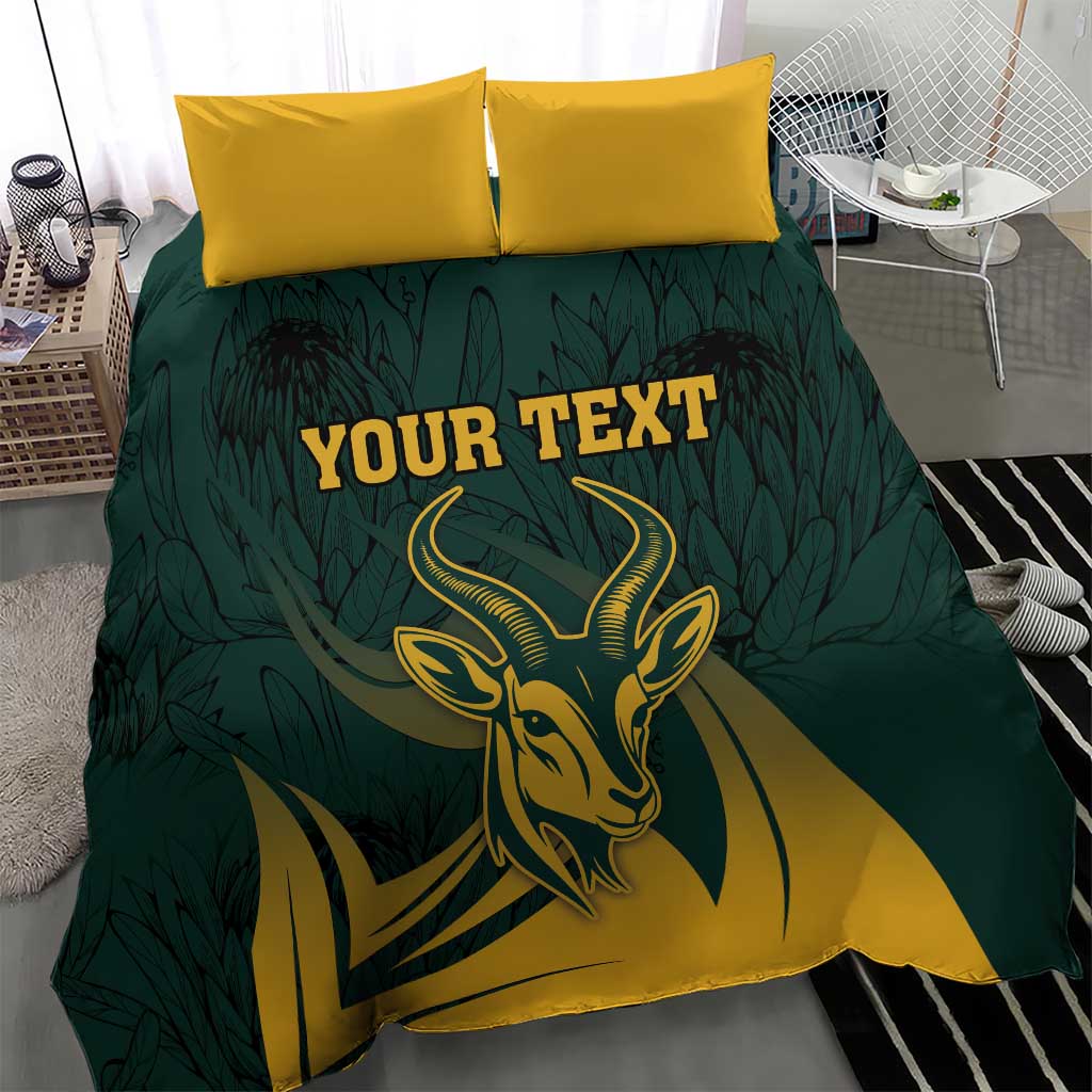 Green duvet cover with springbok graphic and two yellow pillows, “YOUR TEXT”