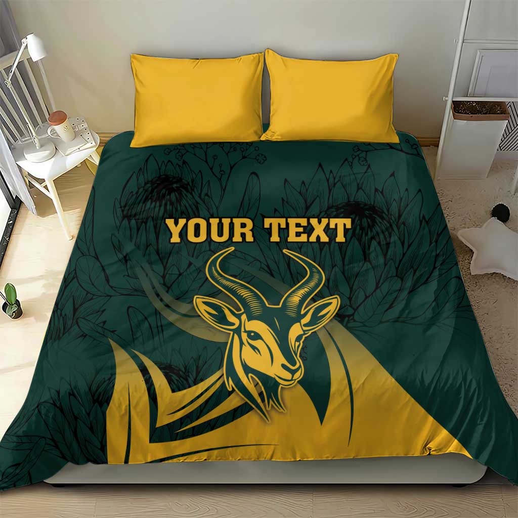 Green and yellow springbok duvet cover with two yellow pillows, centered “YOUR TEXT”