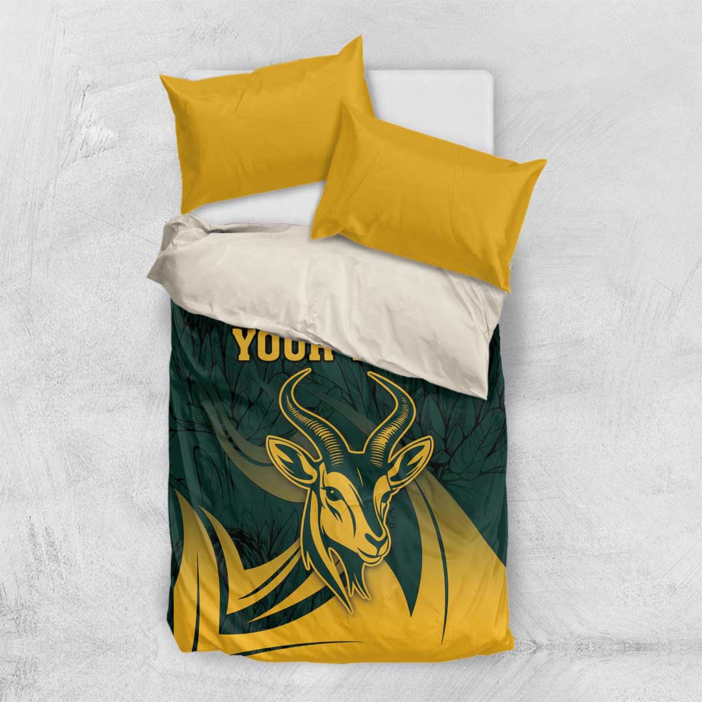 Green and yellow springbok-themed bedding set with two pillows, “YOUR TEXT”