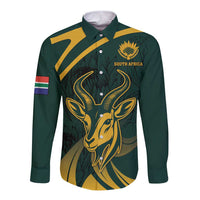Green long-sleeve button shirt with gold springbok front graphic and South Africa flag patch