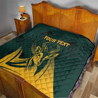 Green and yellow springbok quilt with customizable text on bed