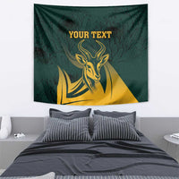 Green springbok wall tapestry with gold emblem and leaf pattern, with editable text