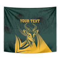Close-up green springbok tapestry with gold head and leaf pattern, centered text