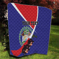 Personalized Belize coat of arms quilt in yard, blue with red/white diagonal and orchid flowers