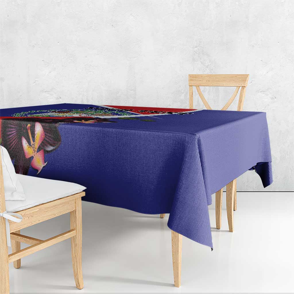 Blue tablecloth with orchid and coat of arms floral design, corner drop style.