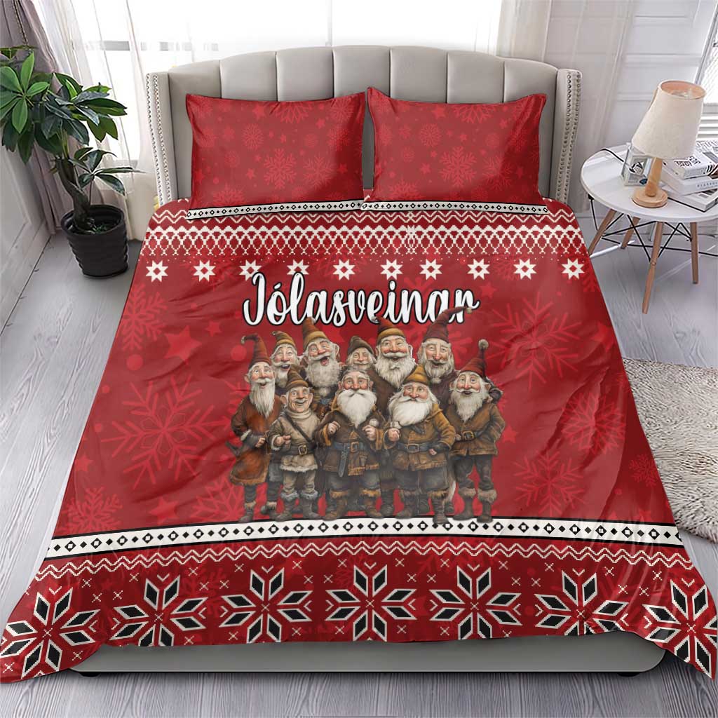 Red bedding set with gnome group print, star-and-snowflake border, and two pillow shams