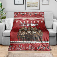 Red Christmas blanket with Yule Lads and Icelandic pattern