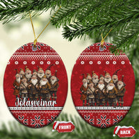 Red ceramic circular ornament with Yule lads group and snowflake patterns, hanging loop