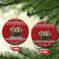 Red ceramic round ornament with Yule lads group and Nordic border, hanging loop