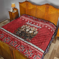 Red quilt with Yule Lads folklore print and Icelandic text