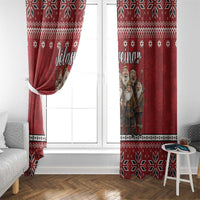 Red curtain panels with Yule lads print and patterned hem