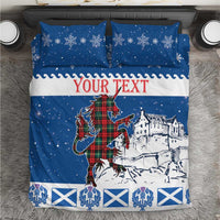 Blue Christmas bedding set with unicorn and castle print, white trim, 'YOUR TEXT' panel