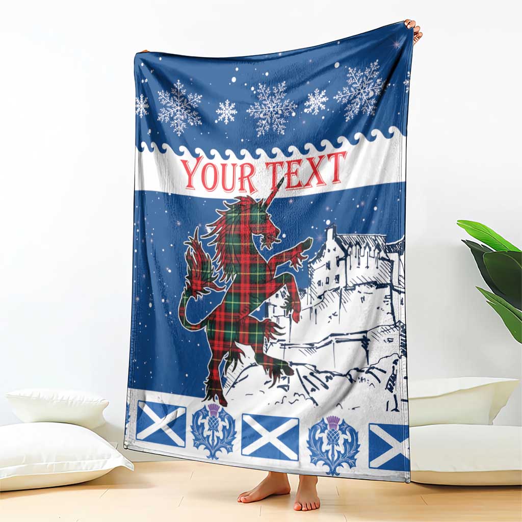 Blue and white personalized blanket with 'YOUR TEXT', unicorn and castle scene
